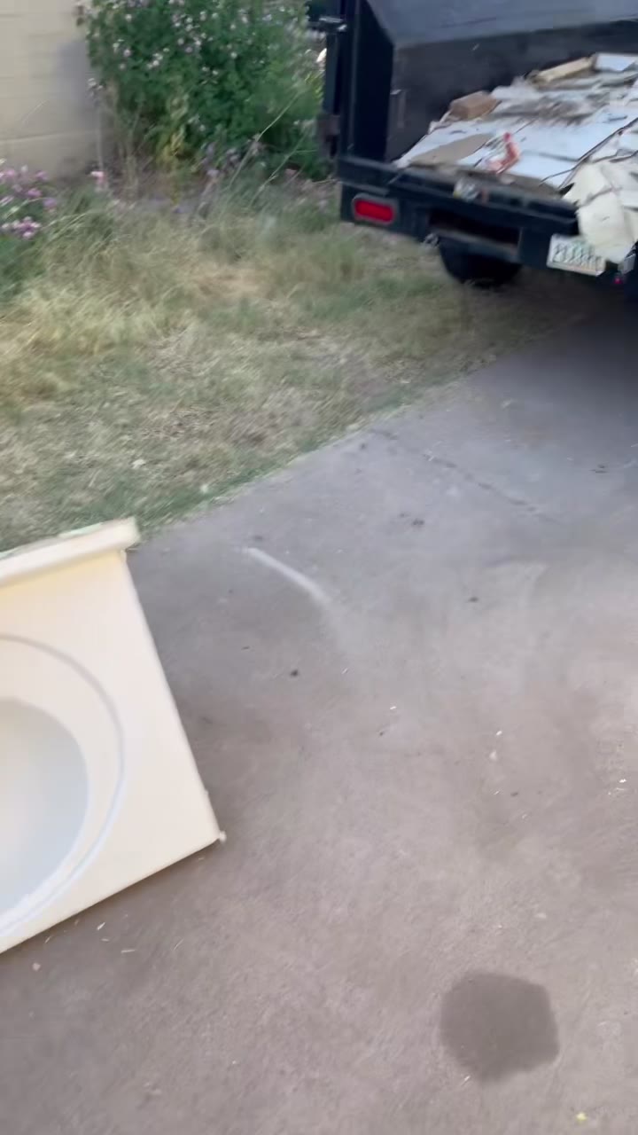 Dump trailer loaded with junk and debris