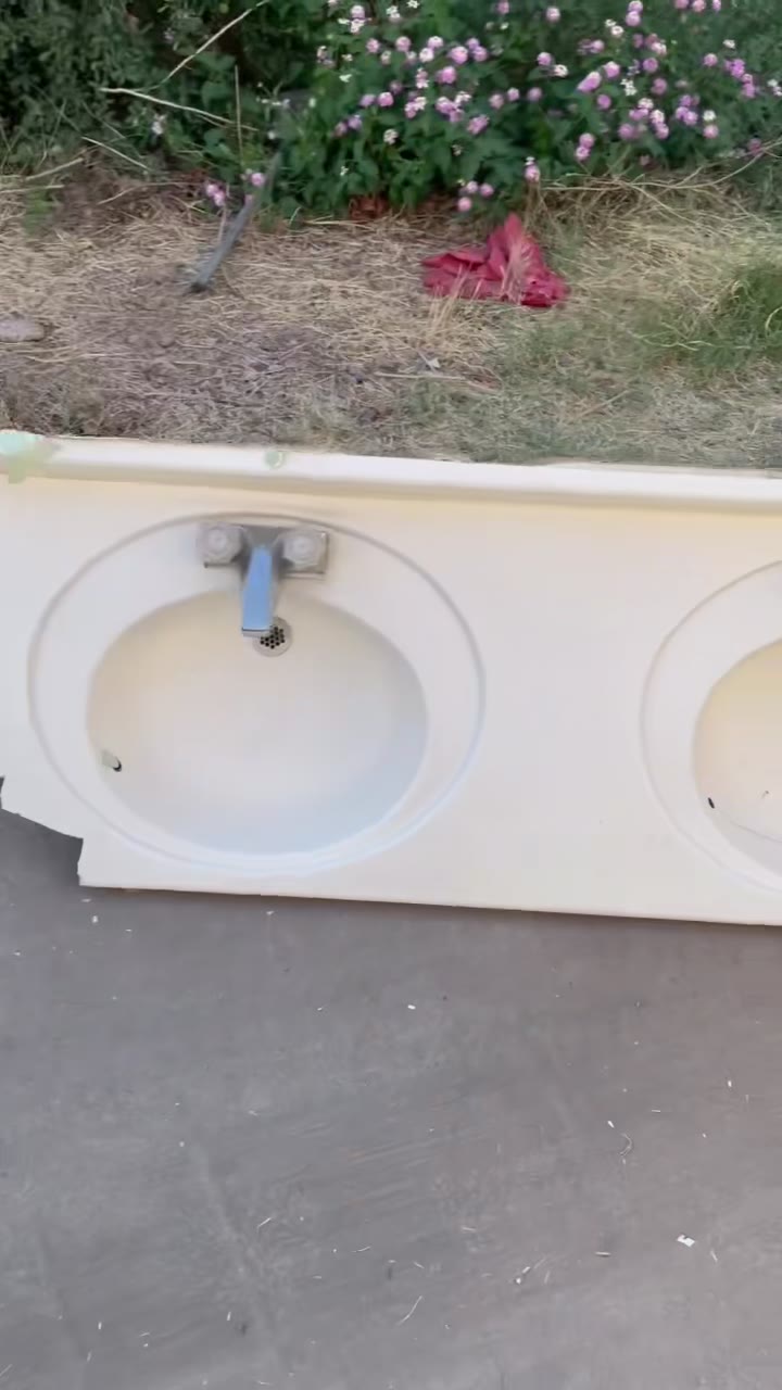 Torn-out bathroom sink and vanity