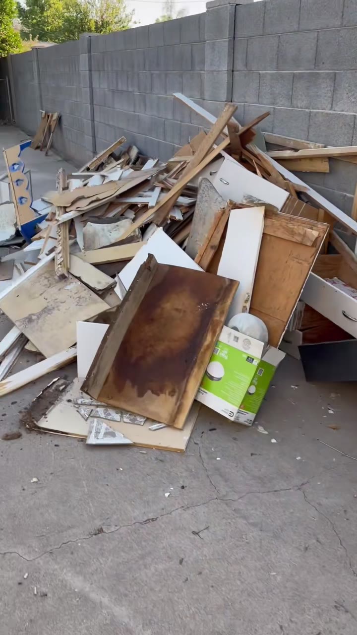 Pile of torn-out debris against a wall